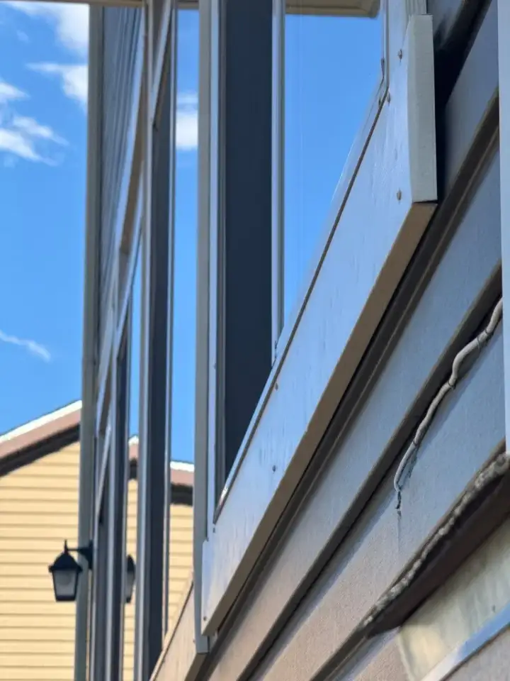Window and trim documented during a roof inspection in Aurora