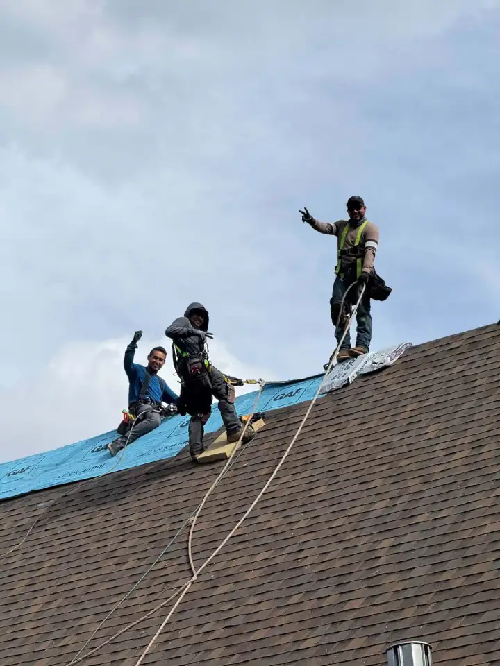 Revival Roofing crew on a roof replacement