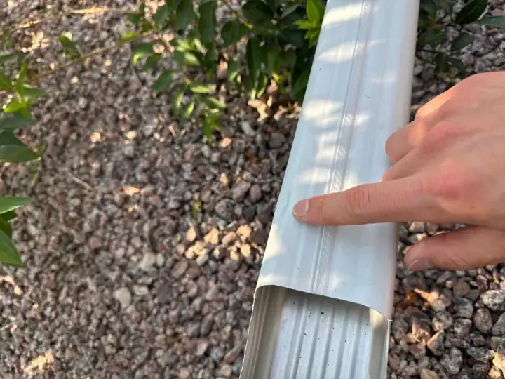 Downspout documented during a roof inspection in Colorado Springs