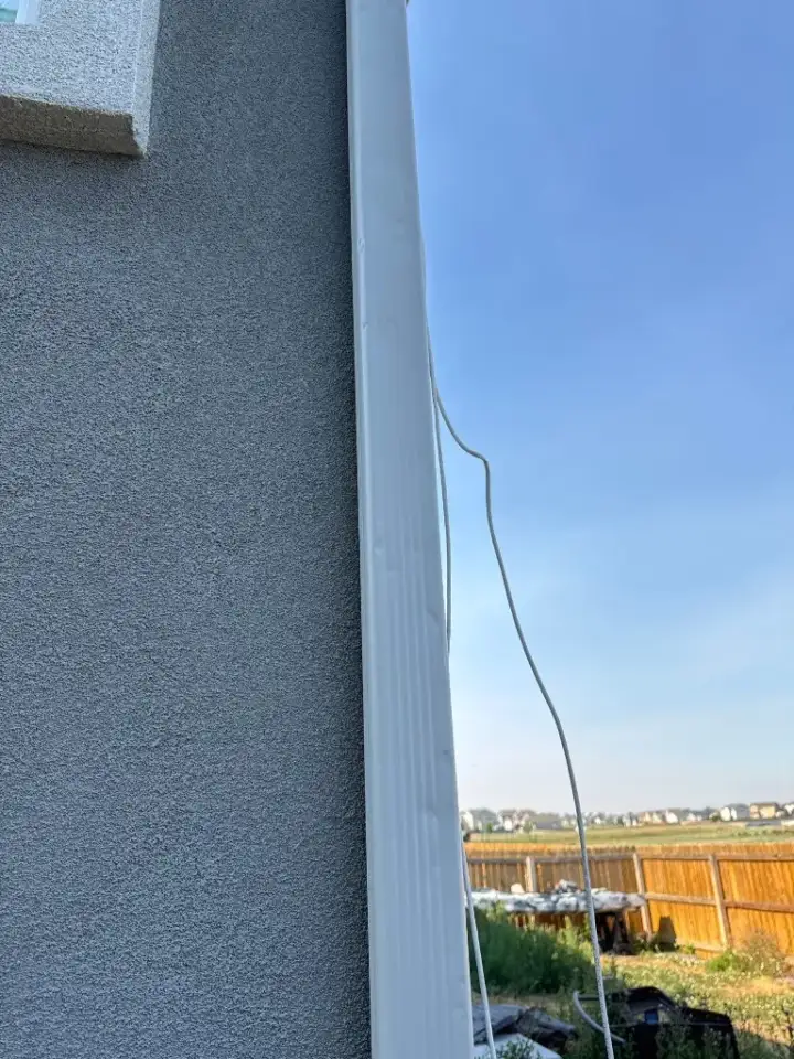 Downspout documented during a roof inspection in Colorado Springs